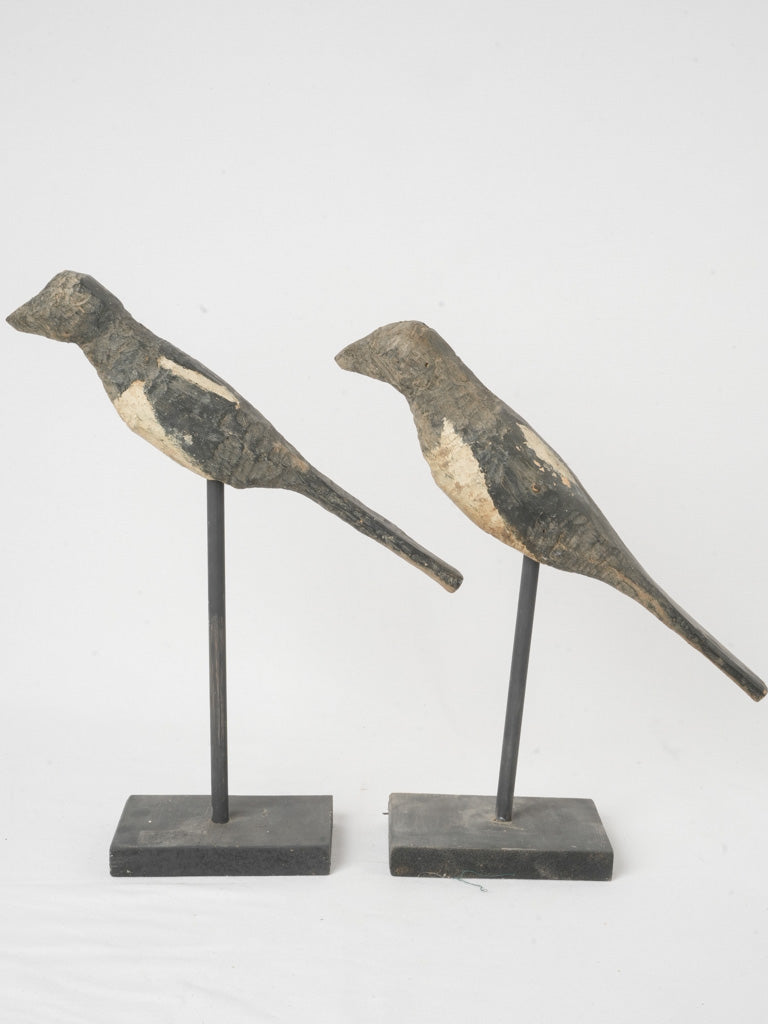 Historic wooden magpie garden statues  