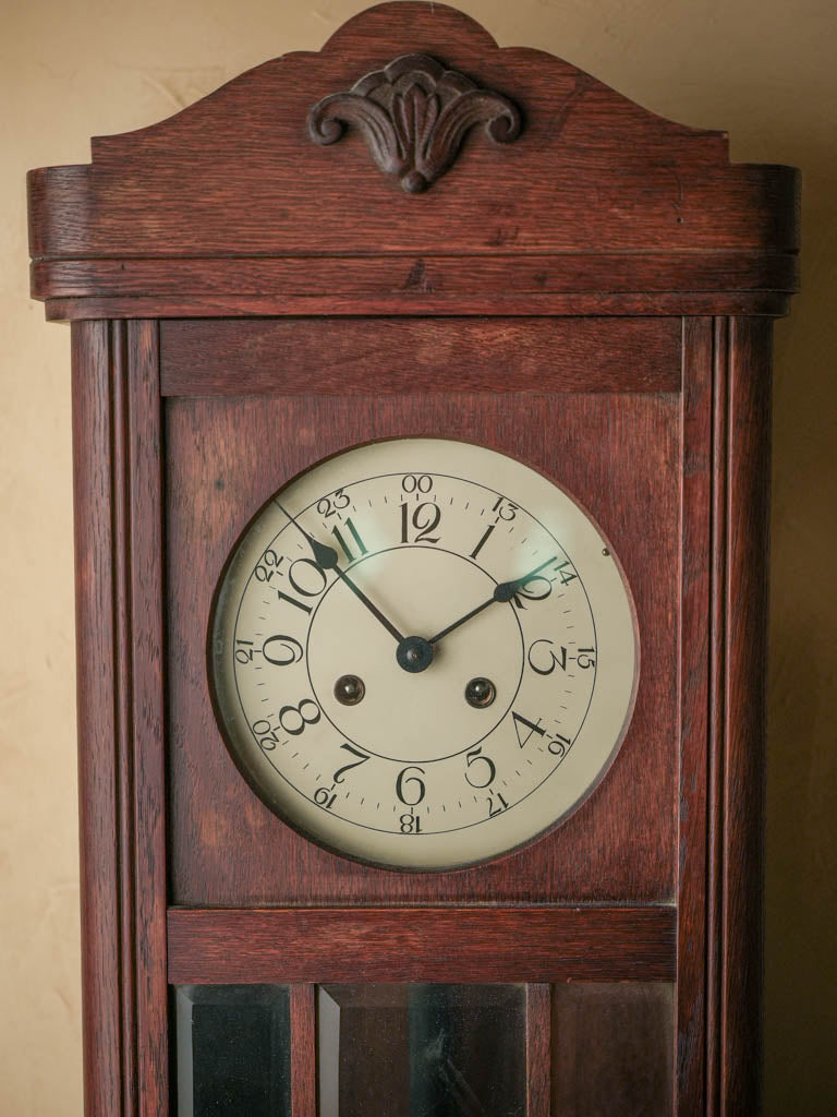 Aged, ornate Westminster wall clock