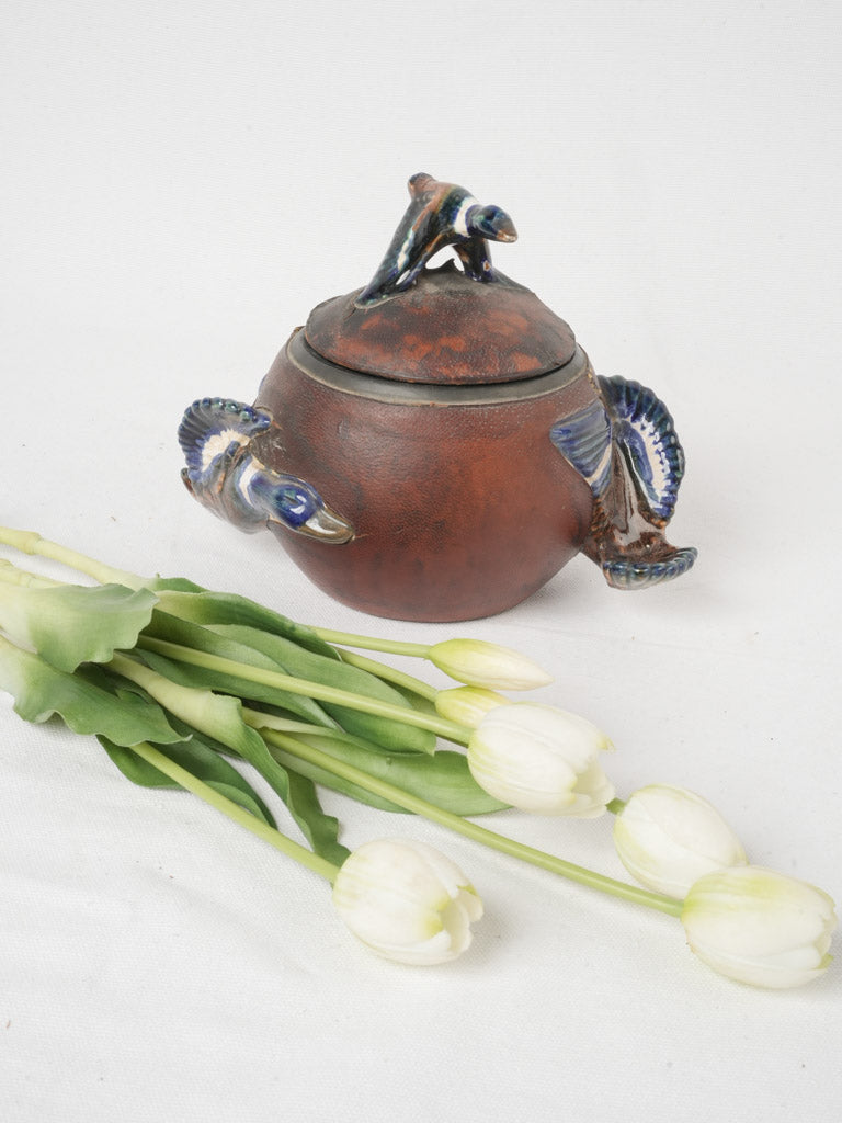 Glazed ceramic duck motif jar