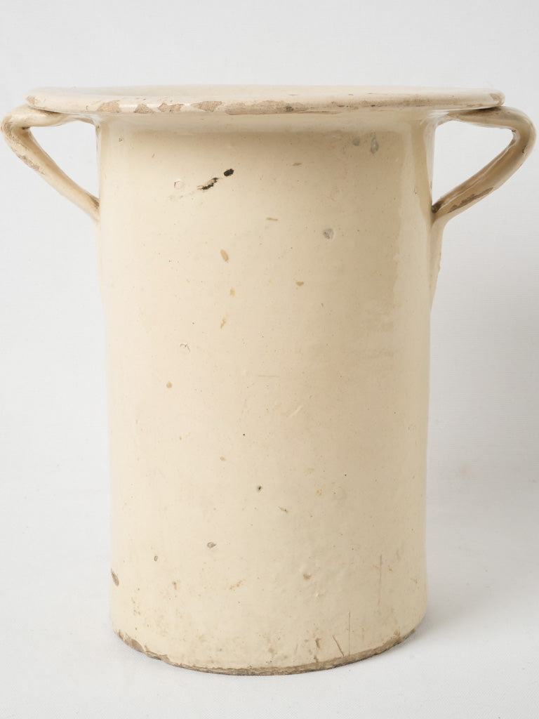 Aged pale yellow Italian pot