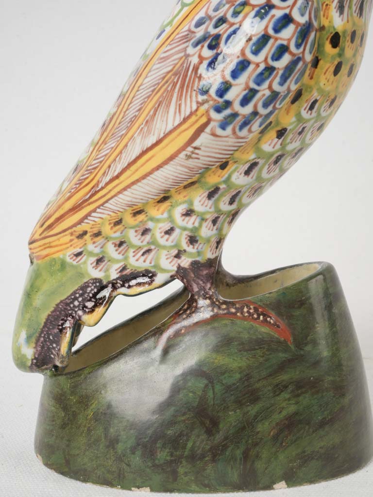 Lifelike expressive faience parrot statue