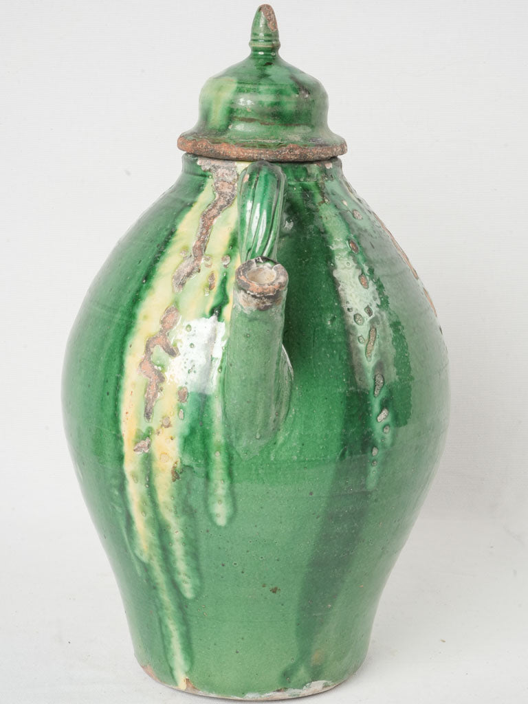 Aged verdant French urn