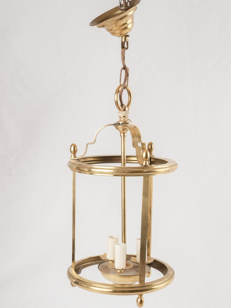 Antique no-glass three-bulb chandelier