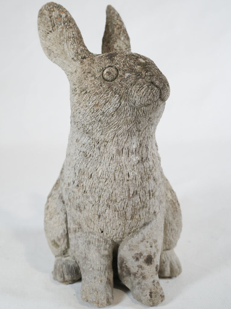 Whimsical weathered French rabbit statue