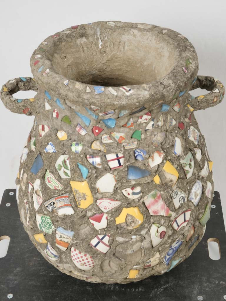 Intricate, old pique-assiette mosaic amphora