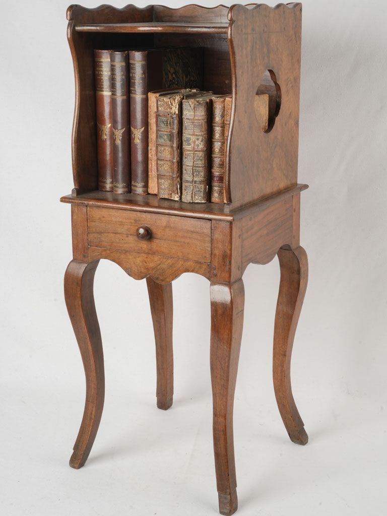 Elegant walnut antique bedside table