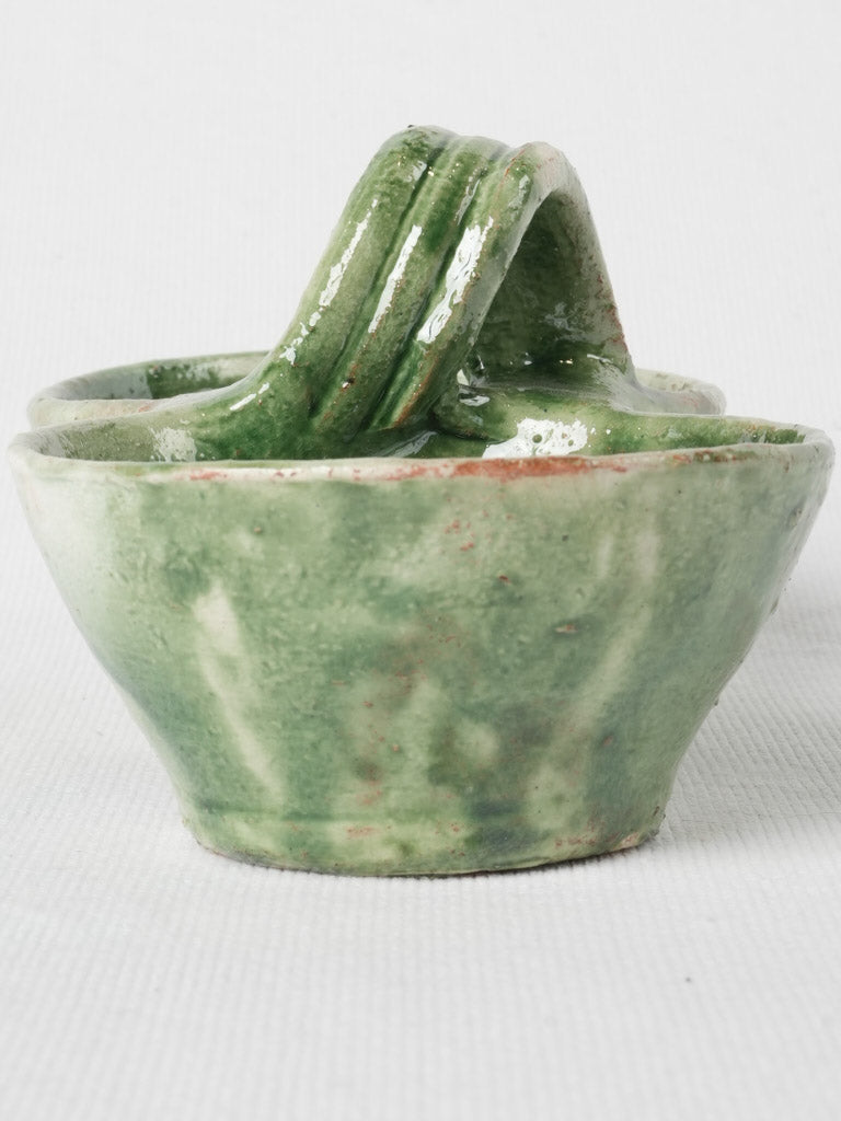 Unique, vibrant, green-glazed salt and pepper bowl