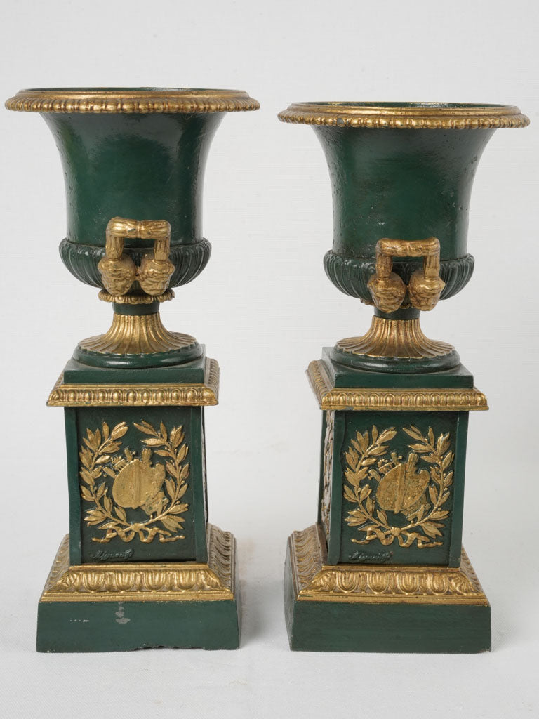 Regal French Cast Iron Urns