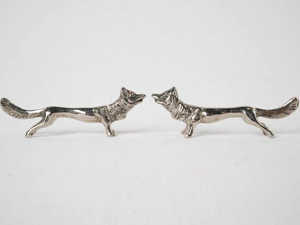 Aged silver-pate wolf rests set