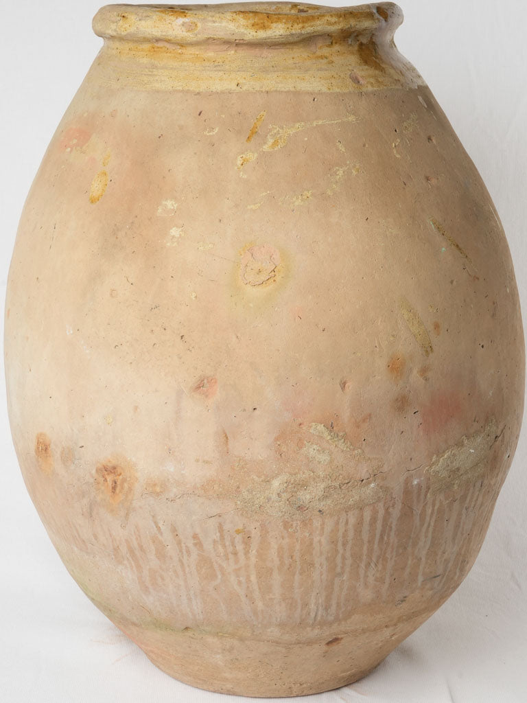 Aged Biot yellow glazed jar