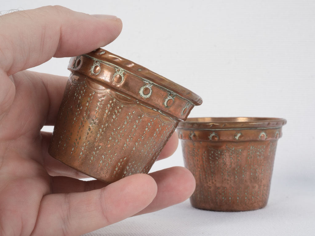 Aged small copper dessert molds