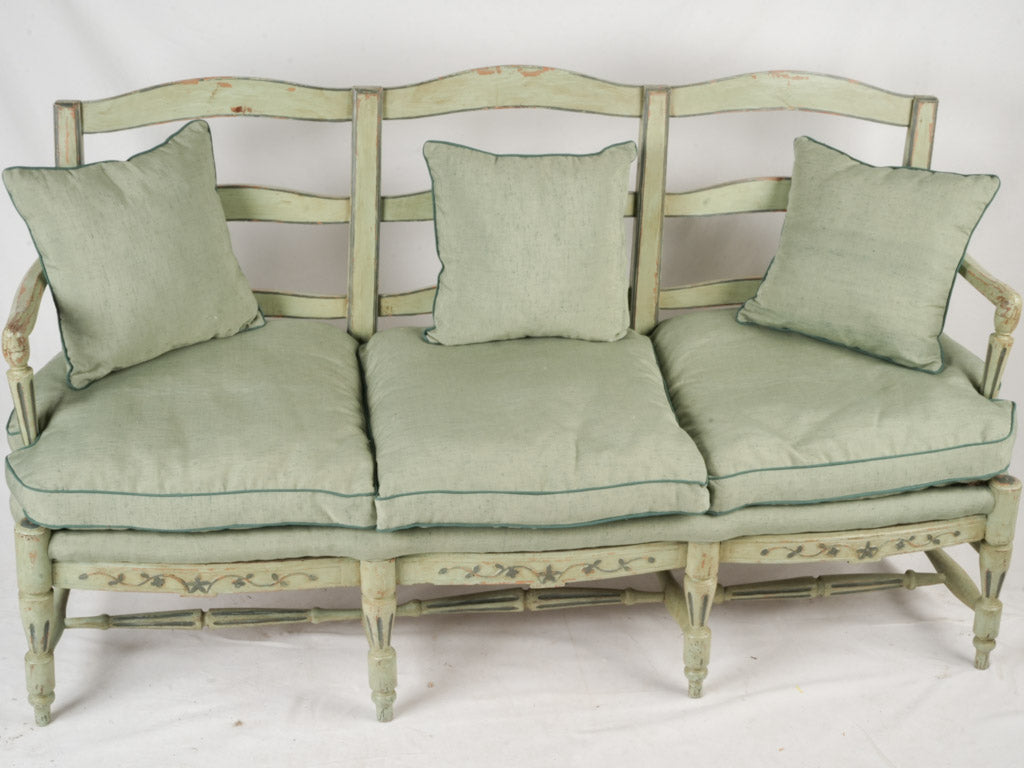 Graceful carved three-seater radassié