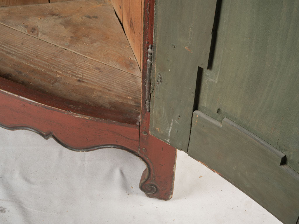 Geometric paneling corner cupboard