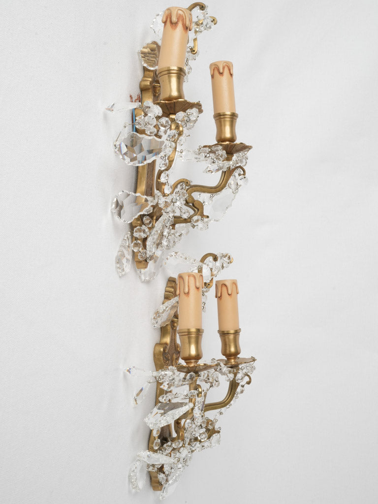 Ornate European bronze crystal sconces