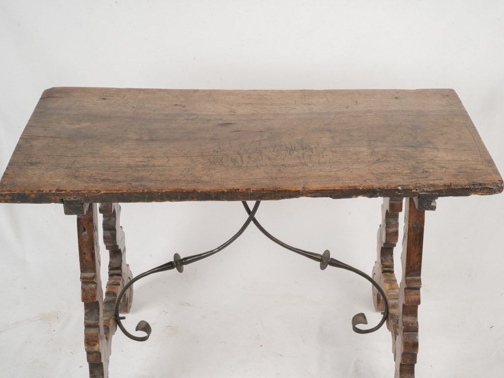 Tuscan-inspired lyre-shaped table