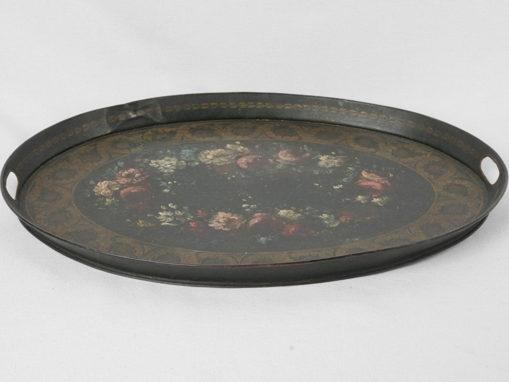 Time-worn oval floral tole tray