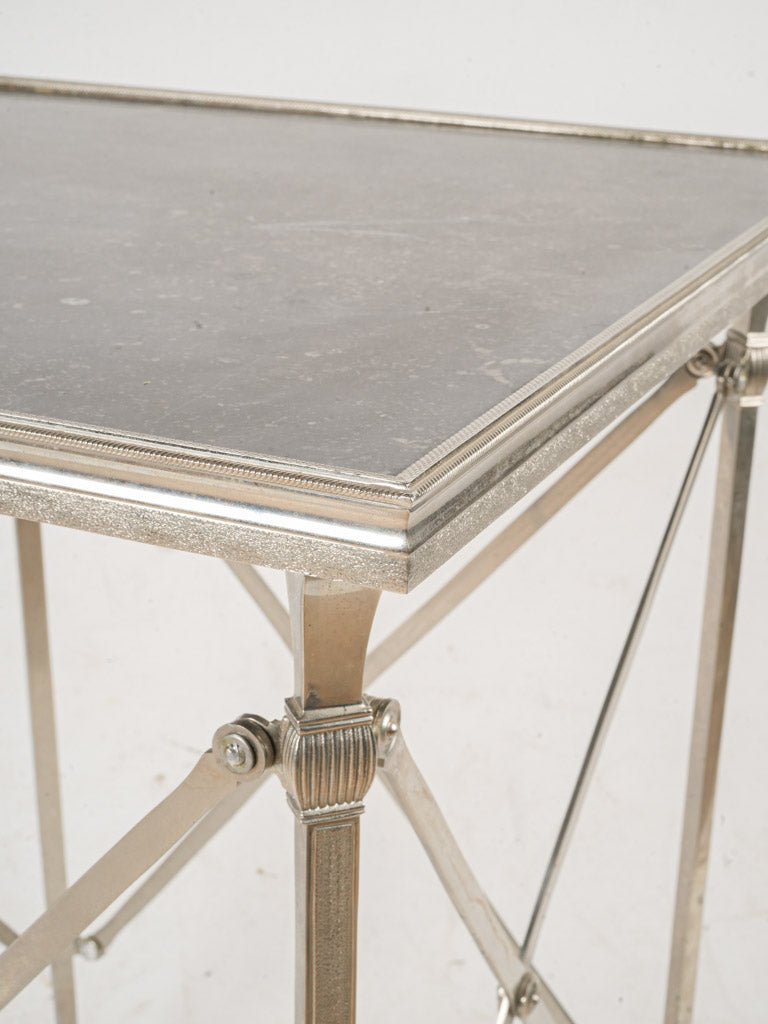 Delicately guilloche-patterned gallery table  