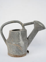 Elegant antique zinc watering pitcher