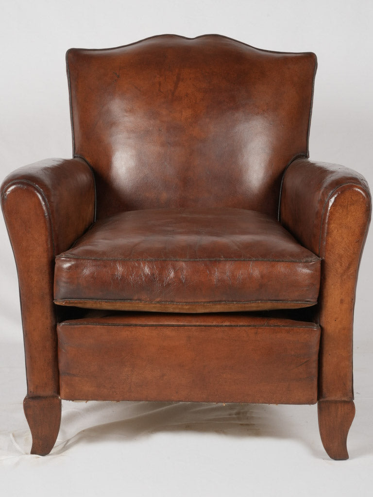 Vintage moustache-back leather armchair