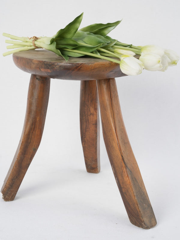 Vintage wooden milking stool, rustic, weathered