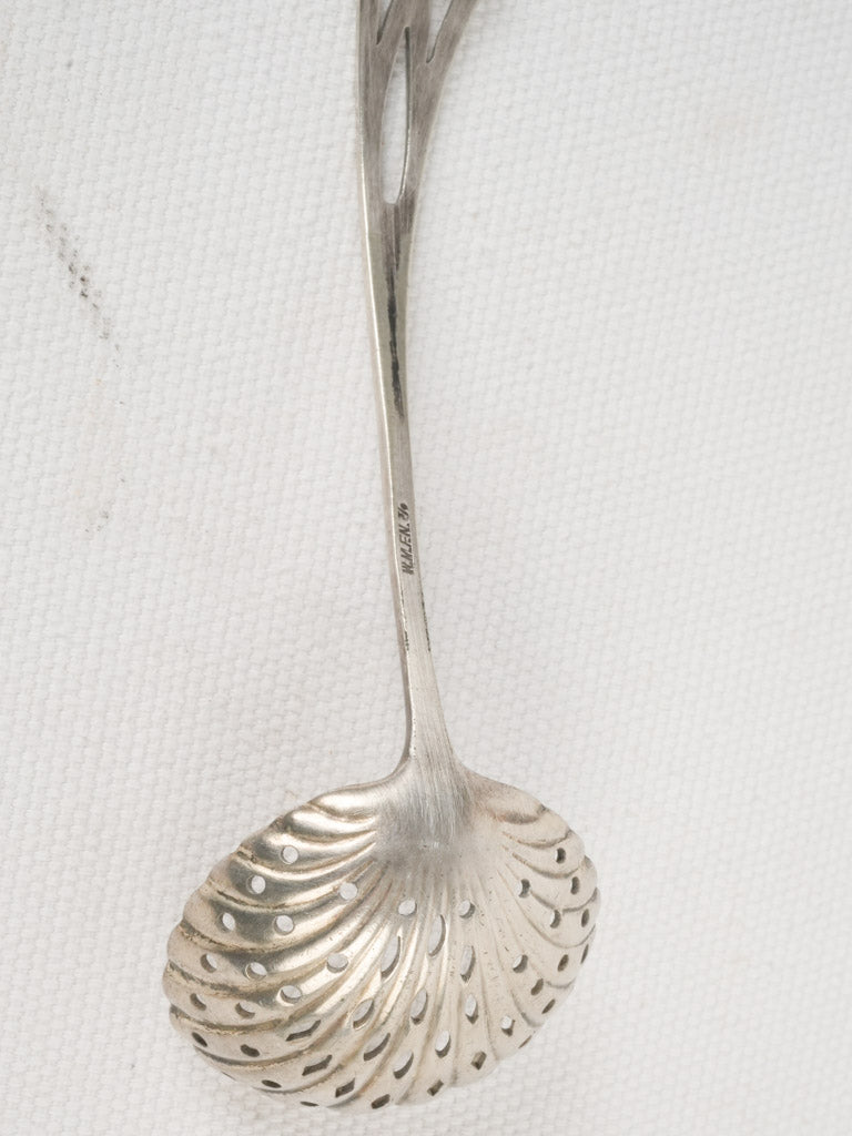 Intricate pierced detailing spoon