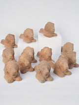 Vintage terracotta lion's head planter risers