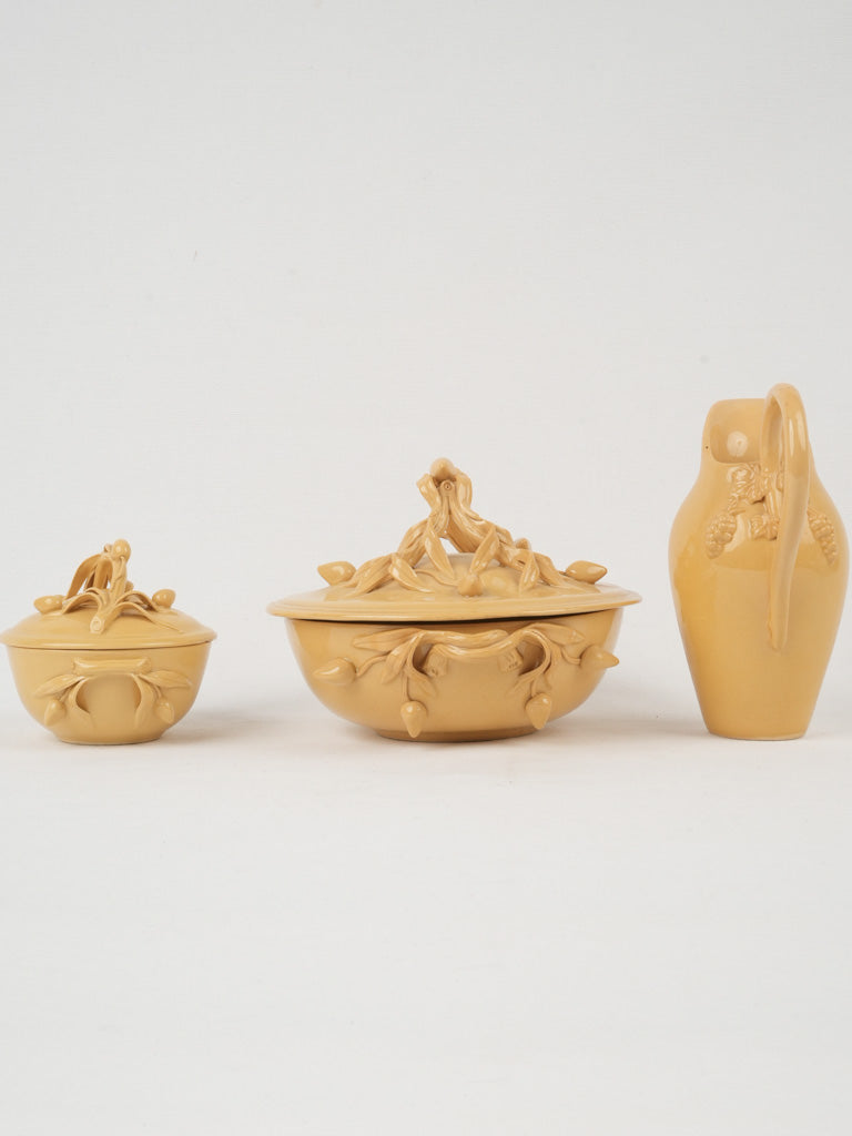 Timeless yellow-glazed olive branch tureens