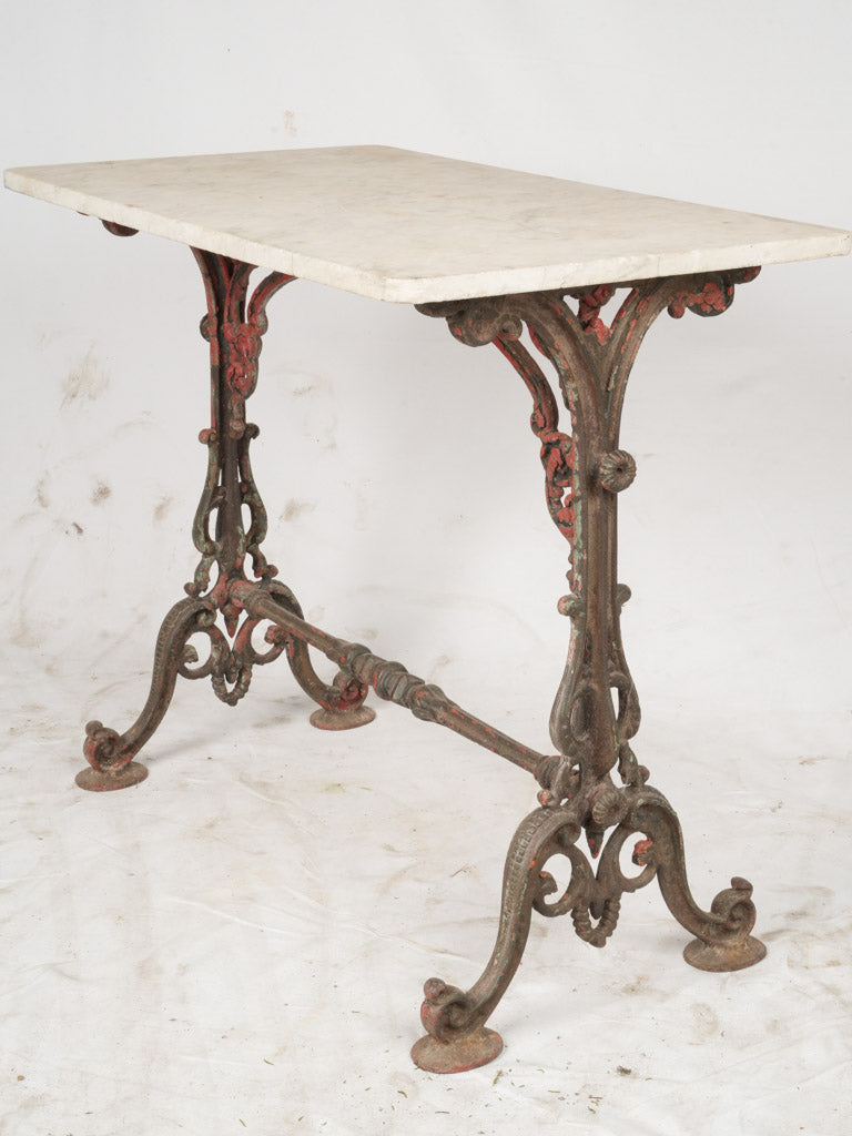 Ornate cast iron antique bistro table