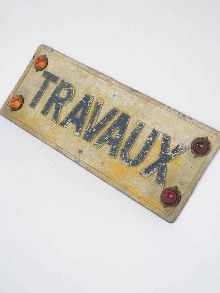 Mid-century, weathered "Travaux" sign