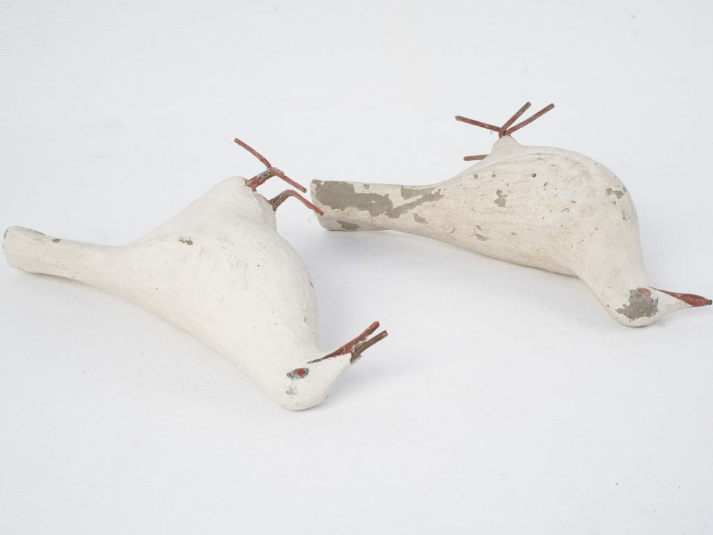 Vintage, weathered white bird sculptures