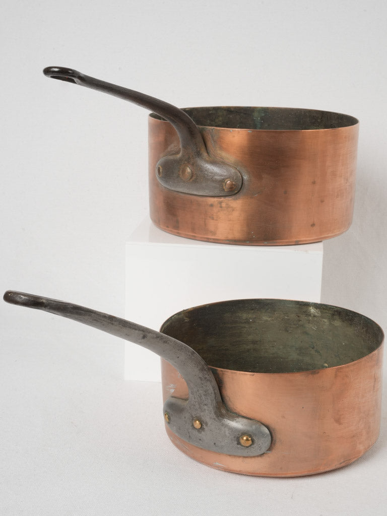 Timeless rustic antique copper saucepans  