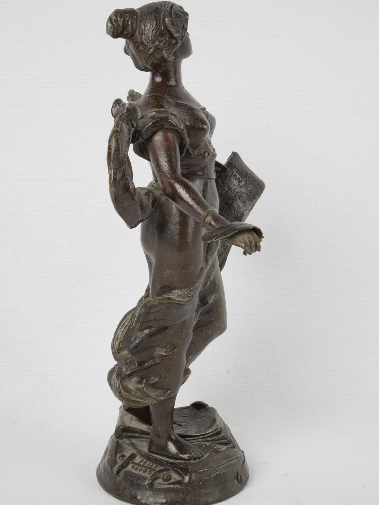 Aged Art Nouveau flower-haired figurine