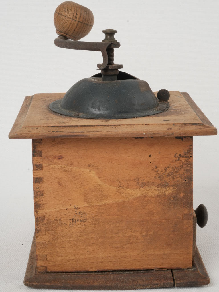 Distinctive stamped brass coffee grinder