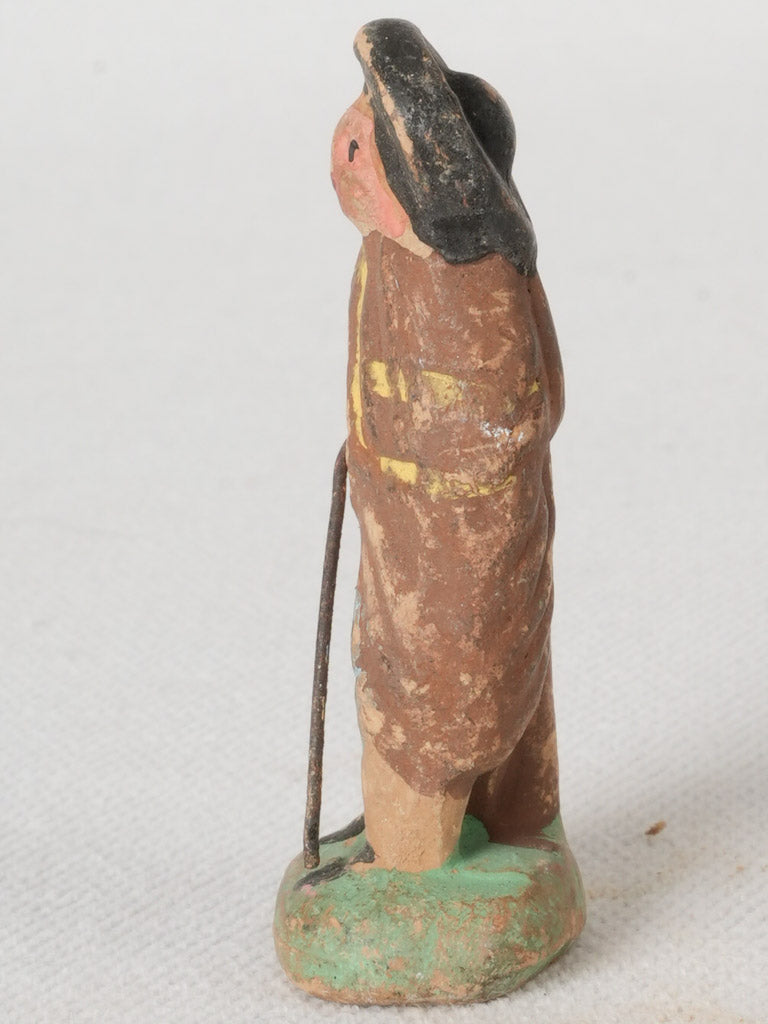 Earthy-toned vintage Santon figure