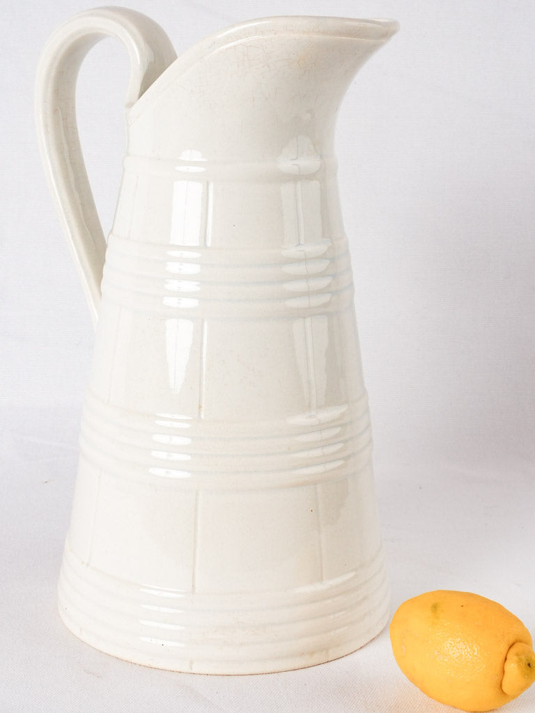 Large white Sarreguemines water pitcher - wine barrel motif 15"