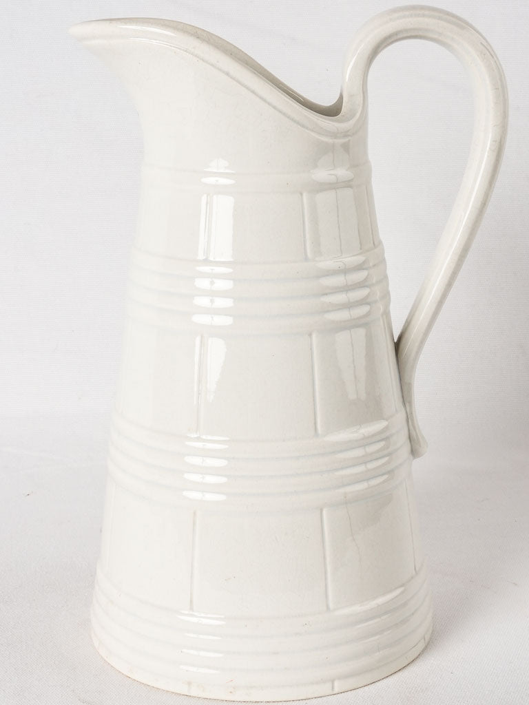 Large white Sarreguemines water pitcher - wine barrel motif 15"