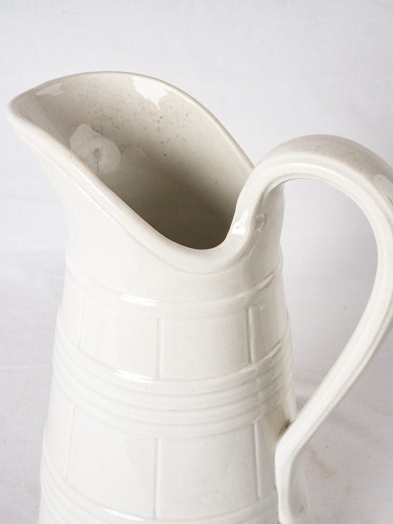 Large white Sarreguemines water pitcher - wine barrel motif 15"