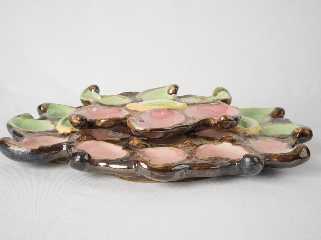 Vibrant historical oyster-serving platter ensemble