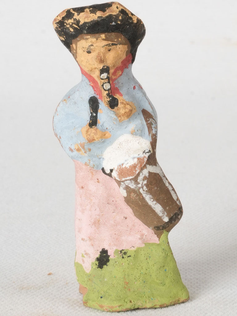 Antique Provençal terracotta piper figurine