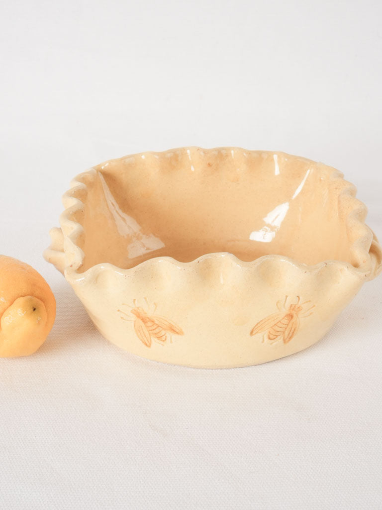 Retro pale-yellow rippled-edge ceramic dish