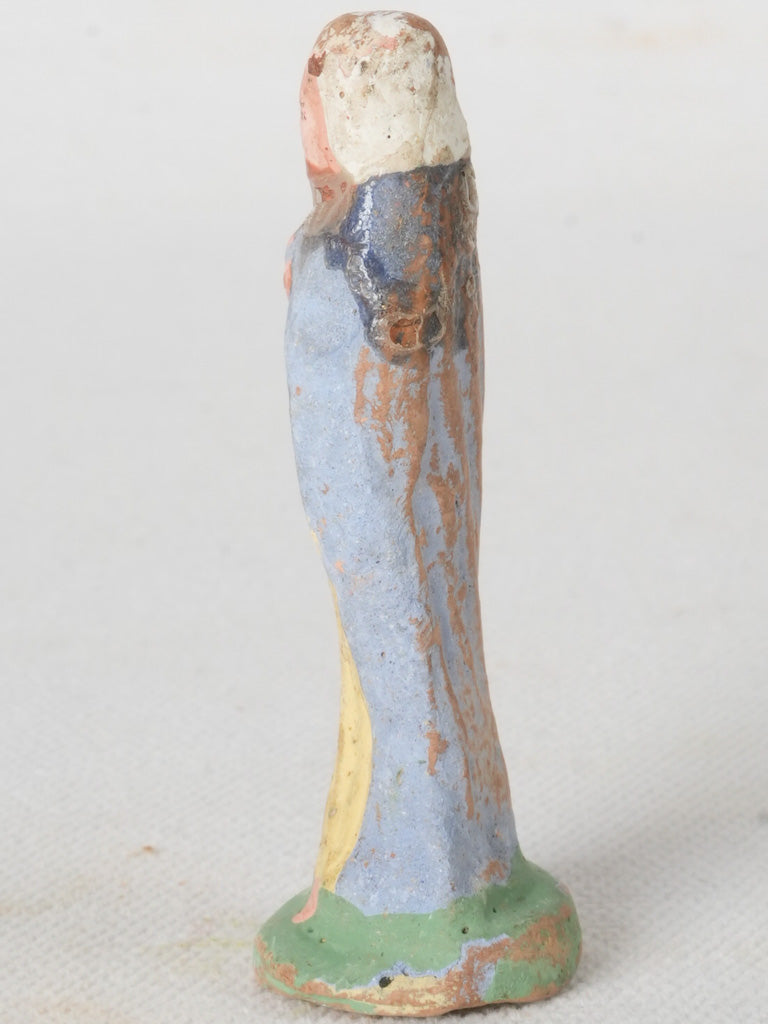 Traditional blue-cloaked nativity figurine