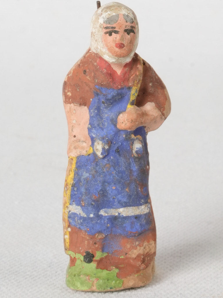 Vintage earthy-toned terracotta figurine