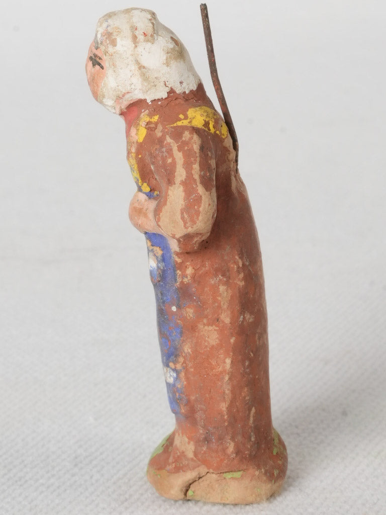 Rustic hand-painted village figurine