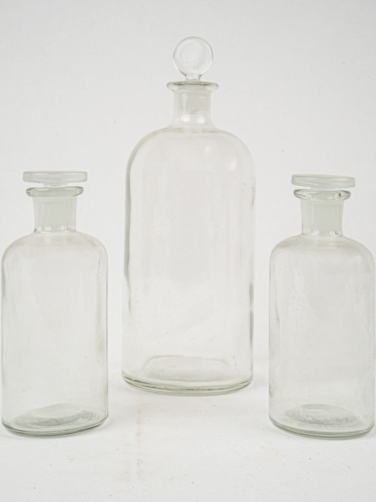 Vintage clear glass bottles with stoppers