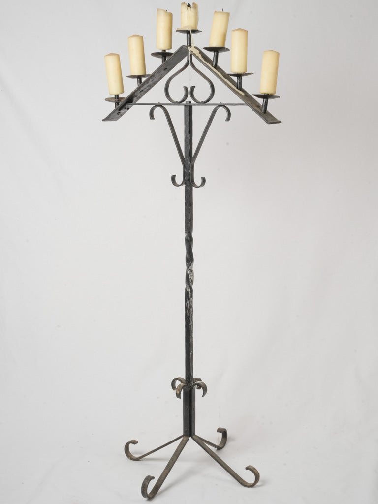 Antique black lacquered iron candelabra