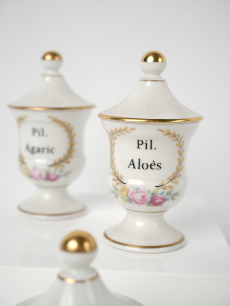 Exquisite Limoges apothecary jar collection