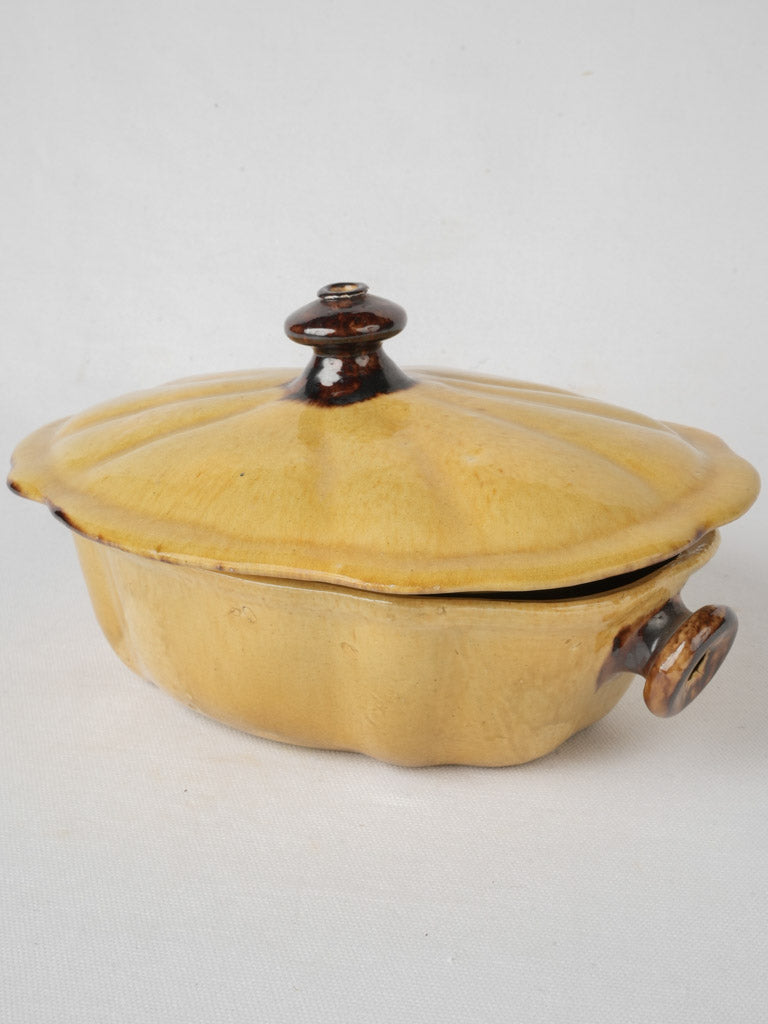 Antique yellow glazed soup tureen  