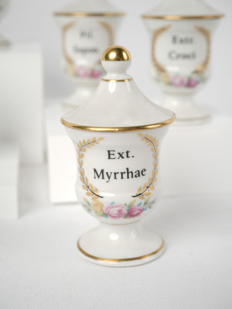 Delicate Limoges porcelain apothecary phials