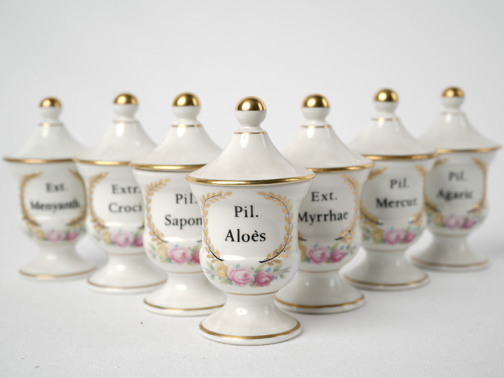 Ornate late-century Limoges apothecary containers