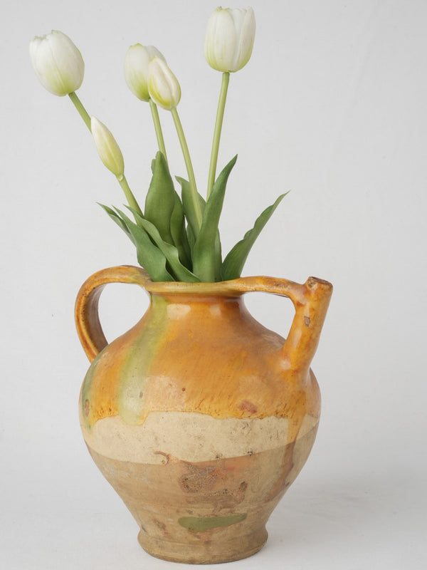 Distinctive ocher-glazed orjol pitcher